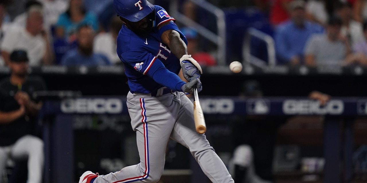 Adolis García collected 3 RBIs as the Rangers dominated the Marlins 8-0,